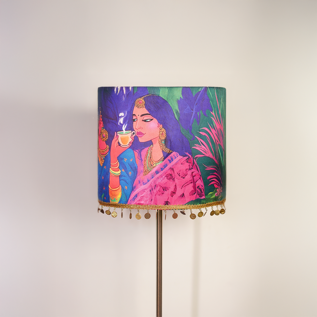 Gulaabi Sip - Sleek metal stand lamp crowned with a quirky pink pop Indian lampshade.