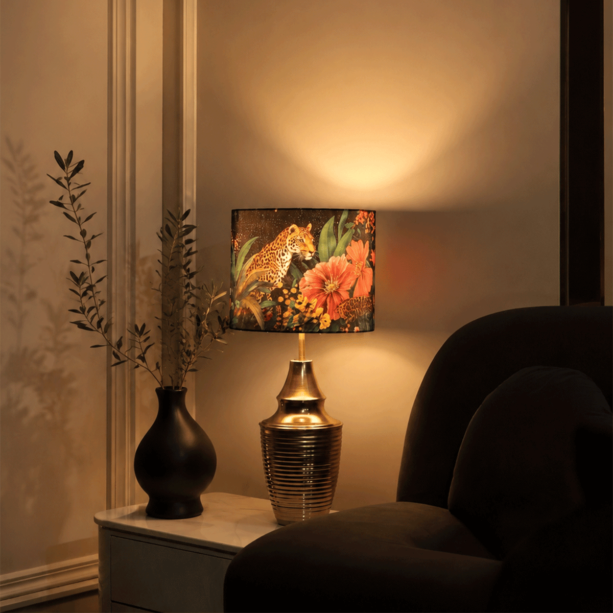 Bagh-e-Bahara - Charcoal black ceramic lamp paired with a vibrant black floral Indian lampshade.