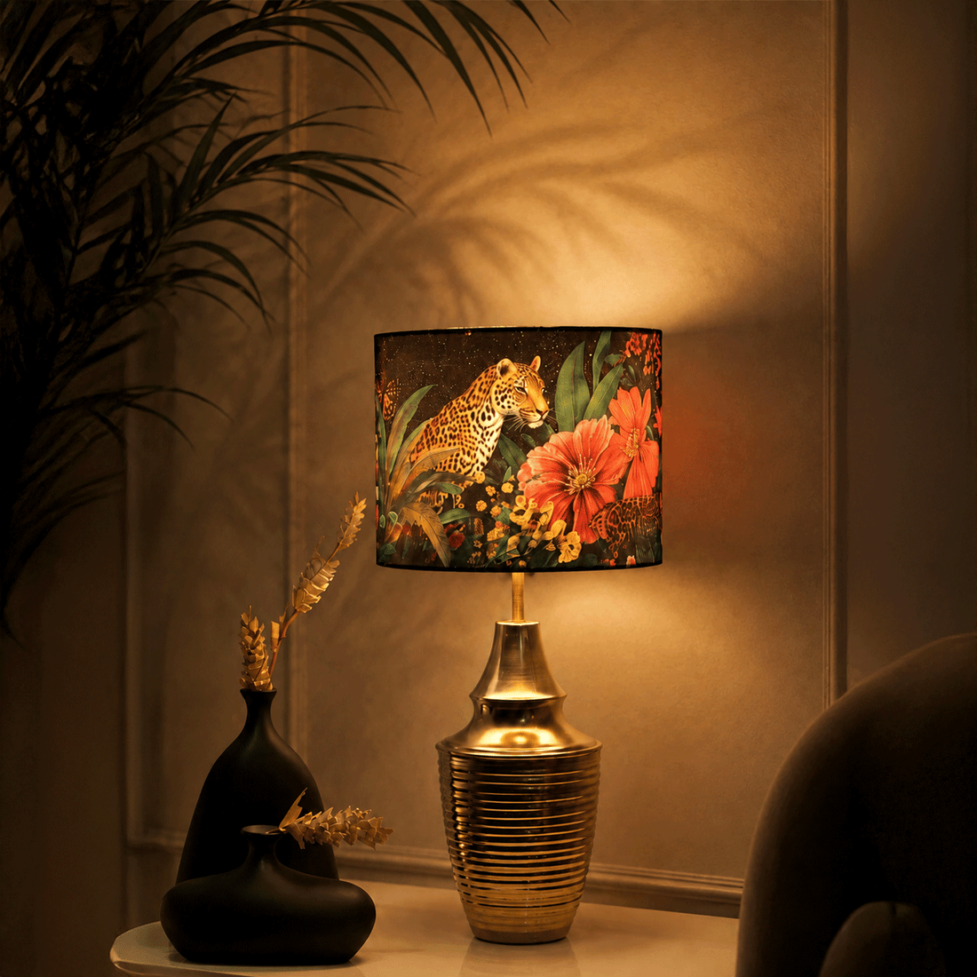 Bagh-e-Bahara - Charcoal black ceramic lamp paired with a vibrant black floral Indian lampshade.