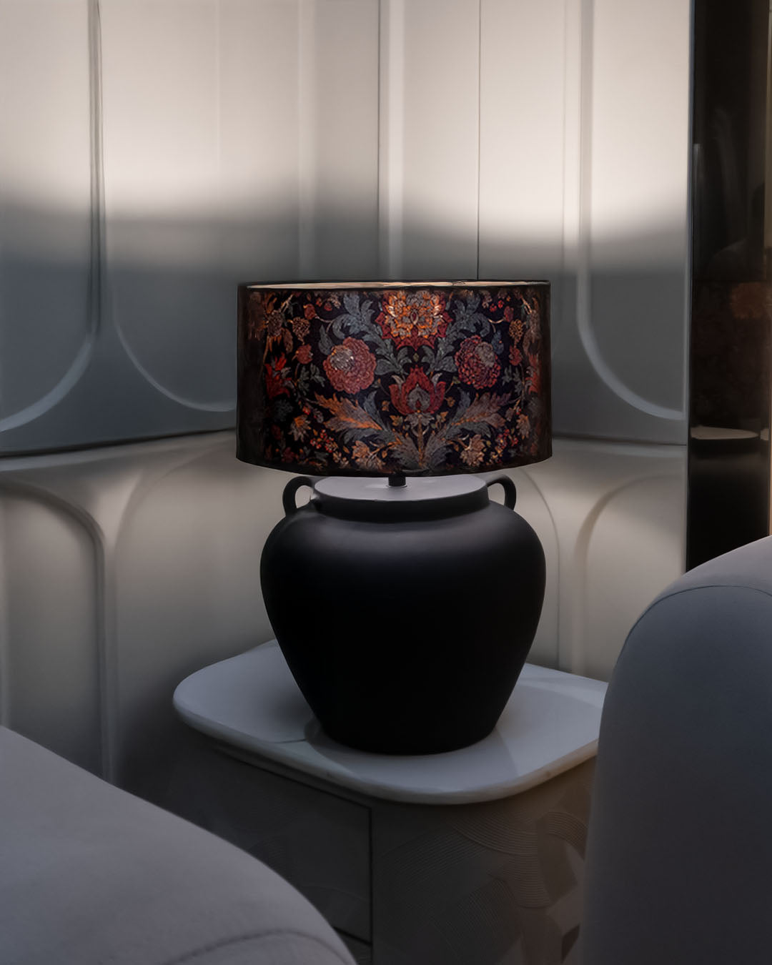 Ziya – radiant glow, charcoal black ceramic lamp .